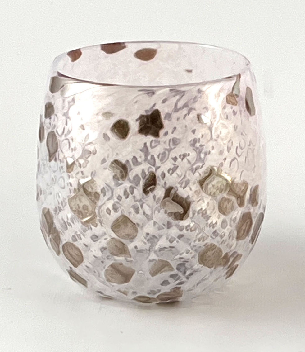Diamond Facet glass tumbler in light pink with gold glittery accents.
